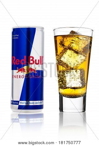 London, Uk - April 12, 2017: Can Of Red Bull Energy Drink With Glass And Ice Cubes On White Backgrou