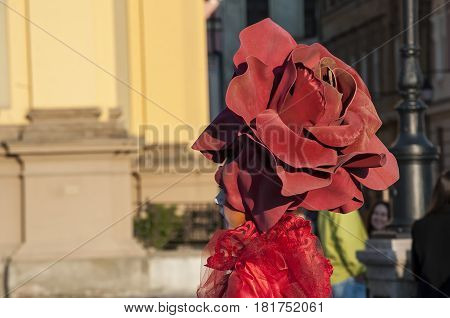 TIMISOARA ROMANIA - March 31 2017: Woman in red dress at the CheckArt Carnaval. Living statue. Union Square.