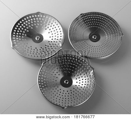 Disks for Rotary grater on gray background