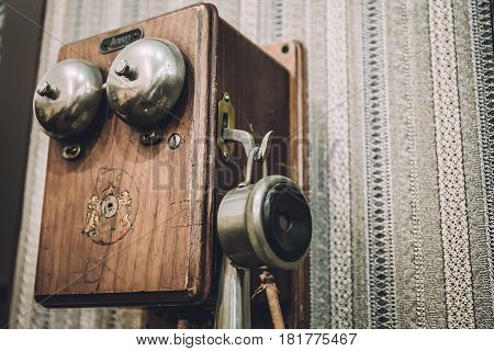 Retro Phone or wooden Vintage Telephone on the wall, copy space