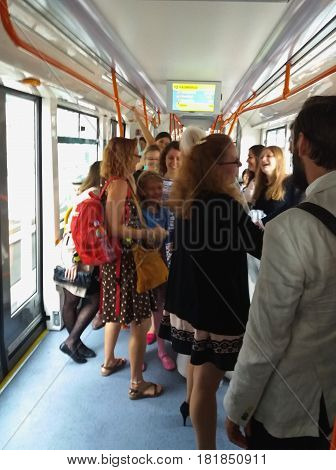 BRNO CZECH REPUBLIC - CIRCA SEPTEMBER 2016: Bride and groom on the tram