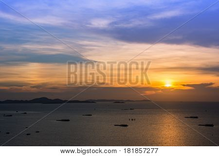 silhouette sescape sunset and fishing boat in pattaya