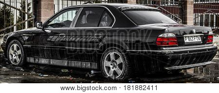 Kazakhstan, Ust-Kamenogorsk, march 29, 2017: Bmw E38 7-series, back view, abandoned car