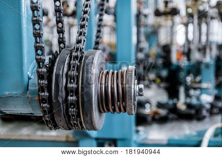 Friction clutch. Chain drive, drive element of braiding machine. Tinted image, Selective focus.