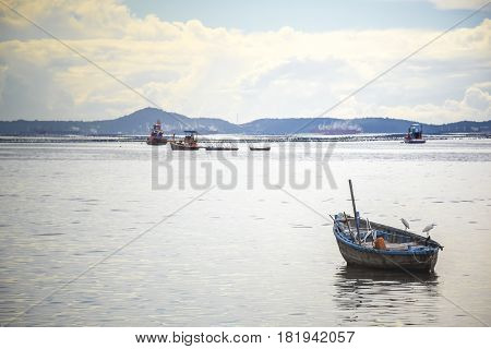 Fish boat in the sea and mountain with soft blur effect