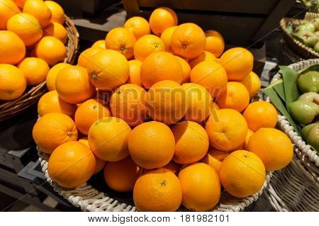 Stack Of Many Fresh Mandarin Oranges In The Market. For Food, Fruit, Kitchen, Texture, Background An