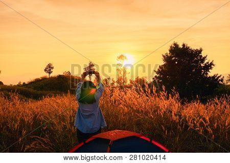 Outdoors Camping Grass Highlands Mountain In The Sunset.