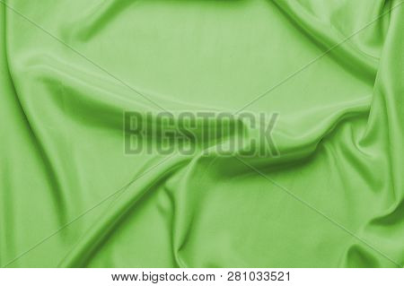 Smooth Silk Fabric Or Green Statin With Waves, Can Be Used As Background Or Wallpaper