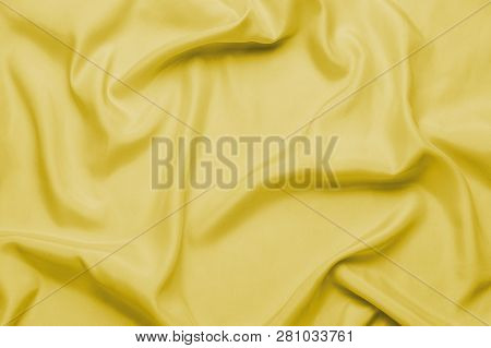 Smooth Silk Fabric Or Statin Yellow With Waves, Can Be Used As Background Or Wallpaper