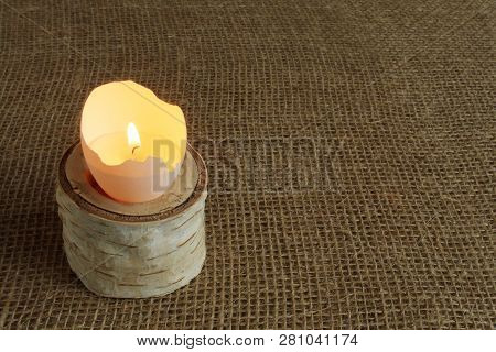 Homemade Candlestick From Branch Of Old Birch With Decorative Candle From Egg Shell Filled With Wax 