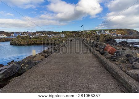 Portpatrick Harbor On An Overcast Day In Scotland, United Kingdom
