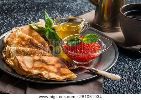 Yeast Pancakes, Traditional For Russian Pancake Week Witn Red Cavier And Honey On Metal Plate, Black