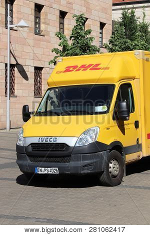 Nuremberg, Germany - May 7, 2018: Dhl Courier Delivery Van In Germany. Dhl Is Part Of German Nationa