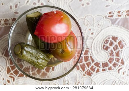 Pickled Vegetables In The Plate. Pickled Tomatoes And Cucumbers.