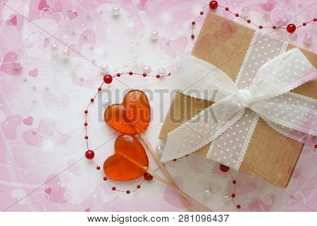 Beautiful Gifts On Grey Background. Valentine Day Concept.red Heart With Brown Recycled Gift Box Ove