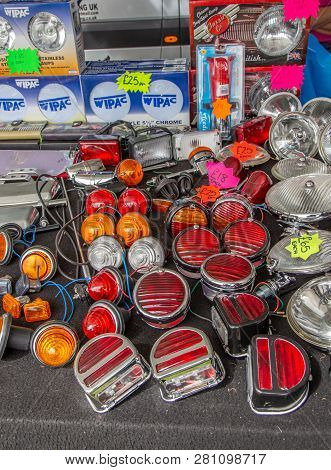 Enfield, Middlesex, Uk - May 24, 2015: Selection Of Vintage Car Lamps, Plain, Red And Orange.