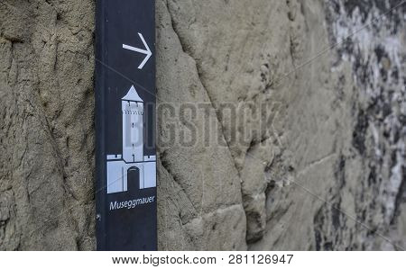 Lucerne, Switzerland - Oct 23, 2018. Sugnboard Of Museggmauer In Lucerne. The Musegg Wall With Its N