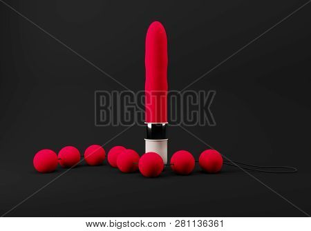 Collection Of Different Types Red Of Sex Toys, Including Dildo
