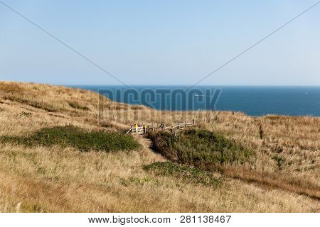 Yellow Grass Against The Sea And Sky; Lulworth; Dorset; View Of Dorset; England; United Kingdom