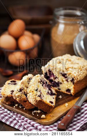 Lemon And Blueberry Crumble Loaf Cake On Rusic Background