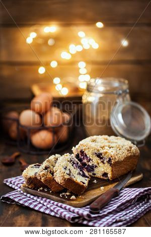 Lemon And Blueberry Crumble Loaf Cake On Rusic Background