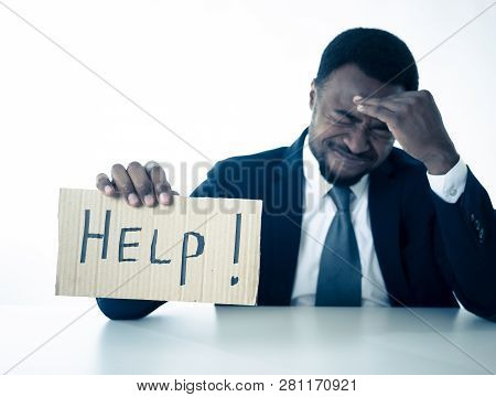 Young Businessman Holding Cardboard With Help Text At Workplace In Stress And Pressure At Work.