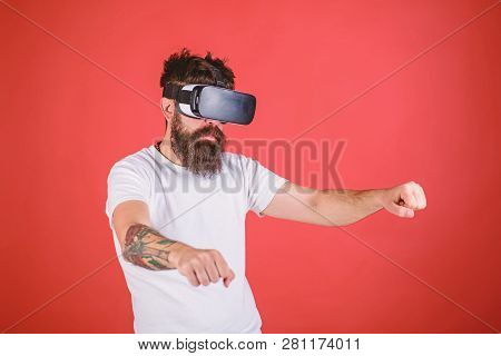 Virtual Racing Concept. Hipster On Confident Face Driving Bike On High Speed In Virtual Reality. Man