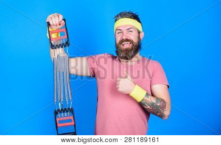 Try Stretching Exercise. Athlete Sport Instructor. Athlete Workout With Expander. Man Bearded Athlet
