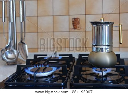 Coffee Maker On The Stove. Details Of The Gas Stove Close-up.