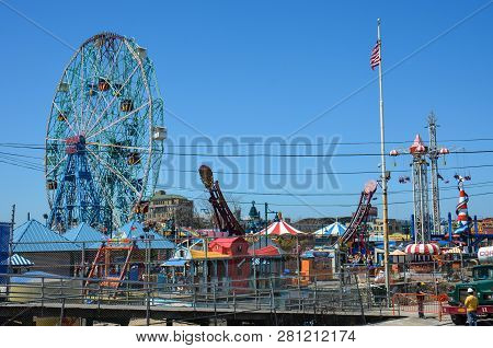 Brookyln, New York - May 10, 2018: A Construction Crew Works Outside Near Luna Park In Coney Island 
