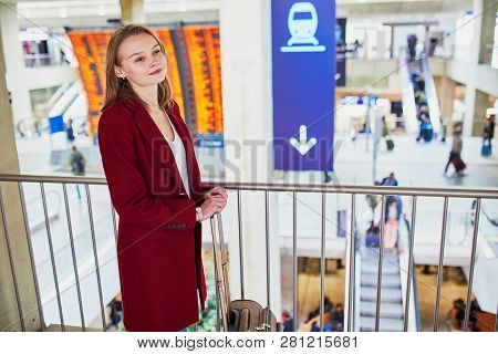 Young Woman Traveler In An International Airport