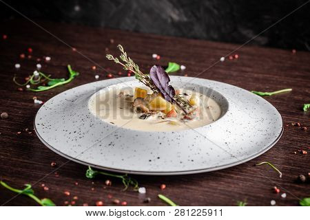 American Cuisine Concept. American Soup Clam Chowder With Chicken Broth And Milk, With Bacon And Mus