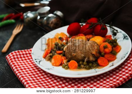 Beef meat stewed with potatoes-Traditional French cuisine Beef Bourguignon potatoes carrots in persillade
