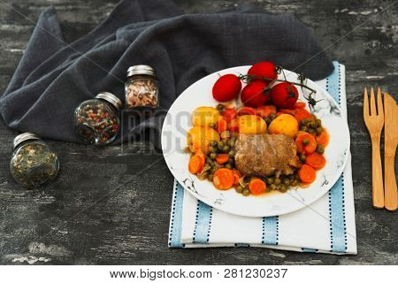Beef meat stewed with potatoes-Traditional French cuisine Beef Bourguignon potatoes carrots in persillade