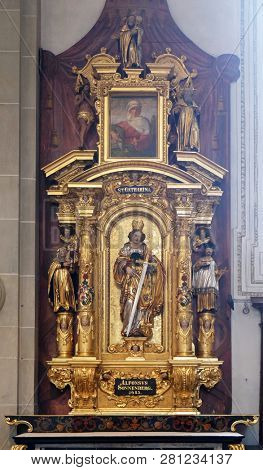 LUCERNE, SWITZERLAND - JUNE 24, 2018: Altar of Saint Catherine of Alexandria in the church of St. Leodegar in Lucerne, Switzerland