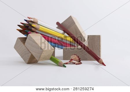 Wooden Colored Pencils On A White Background