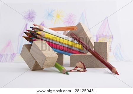 Wooden Colored Pencils On A White Background
