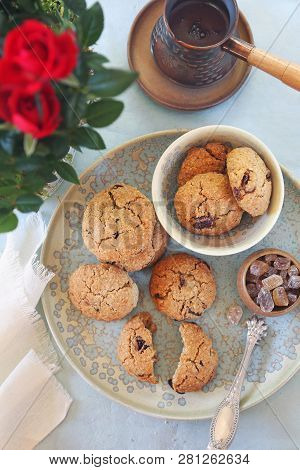 Nice And Healthy Dessert. Homemade Oatmeal Cookies With Dried Cranberries And Coffee In Cerve. Top V