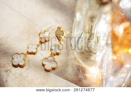 Silvery Golden Bracelet Of Brilliant Decorative Flowers For A Special Occasion Lying On The Table, S