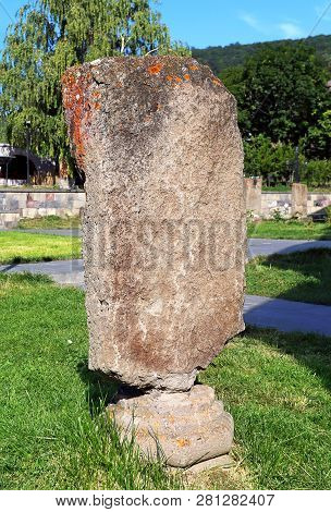 Typical Armenian Ancient Tombstone, Consisting Of A Vertical Stone Slab On The Foundation