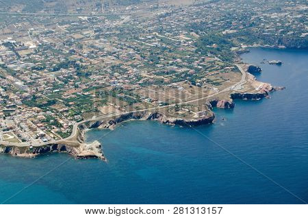 Aerial View Of The Rocky Headland Around Terrasini In The Palermo District Of Sicily. In The Middle 