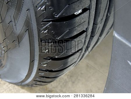 Polished Sidewall Of Car Tire On The Alloy Wheel Rim Close Up