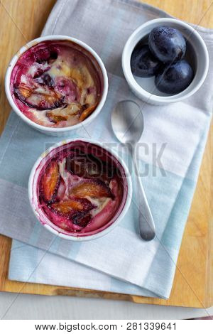 Just baked plum clafoutis. Top view