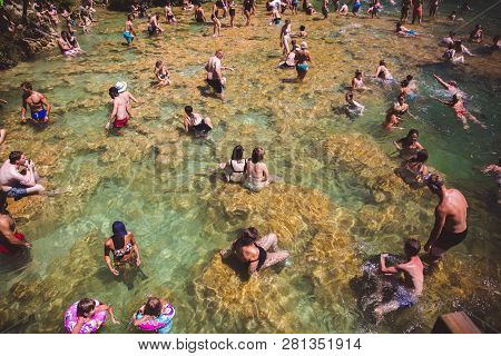 Krka National Park, Croatia - Aug 13, 2015: Plenty Of Tourists Enjoy Swimin In Krka Waterfalls In Th