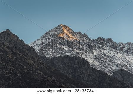 Snow Capped Peak Of Monte San Parteo Mountain In Corsica