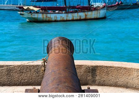 An Old Cannon On The Embankment In Stown Town, Zanzibar