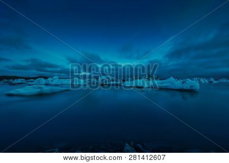 Faint Aurora Borealis At Jokusarlon Glacial Lagoon, Southeast Iceland.