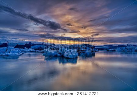 Sunset At Jokusarlon Glacial Lagoon In Southeast Iceland.