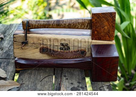 Mallet Hammer Made Of Burl Wood Tools For Used By Carpenter In Workshop On Isolated Blurred Backgrou