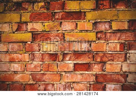 Red Brick Wall With Moss Texture Grunge Background With Vignetted Corners